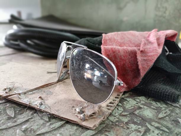 istock The sunglasses were placed on the worn metal table 1319161783