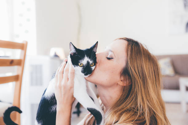 Playful Caucasian Woman with her Cat