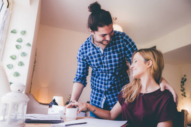 istock Young Couple Enjoying their Weekend Morning at Home 1319162704