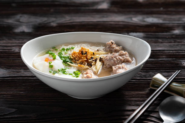 istock Thai style clear soup rice noodle in traditional bowl. Selective focus 1319163557