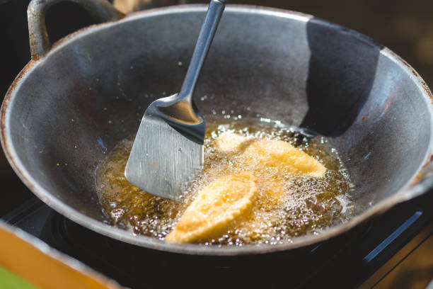 Deep Frying Pan Royalty-Free Images, Stock Photos & Pictures