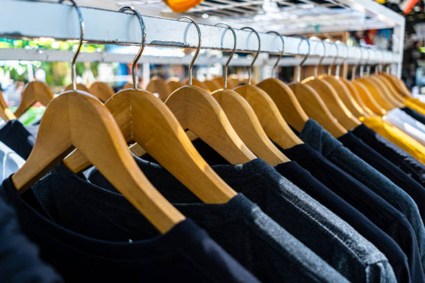 istock Clothes hang on the sales rack. 1319164702