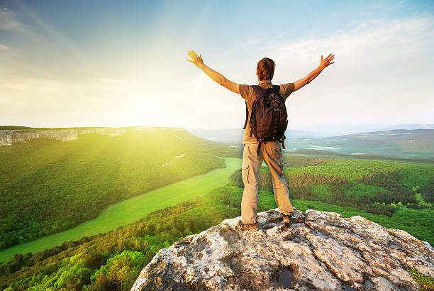 istock Man on top of mountain 131916640