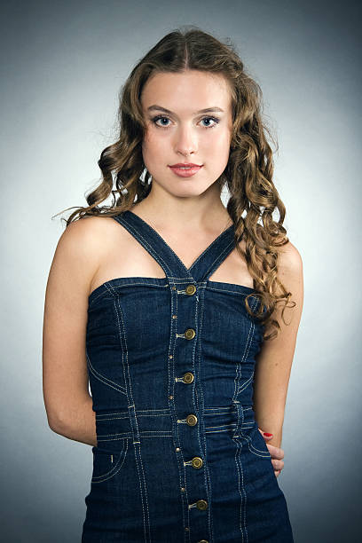 Portrait of a pretty young girl with long ringlets hair stock photo