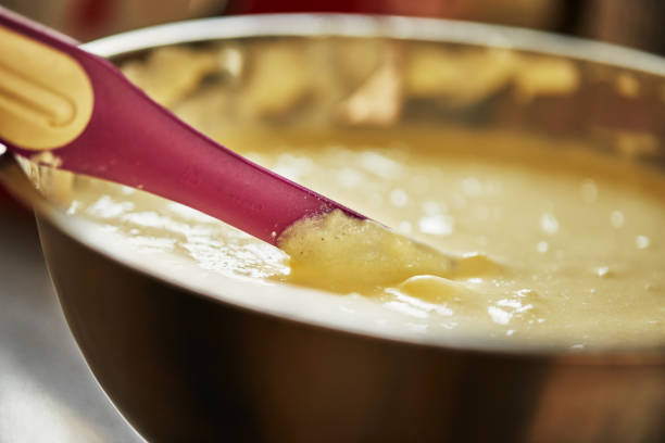 istock Ready dough with spatula to make cheese pie with zest, step by step recipe from the Internet 1319167722