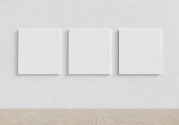 istock Gallery exhibition interior with three blank mockup canvases. Presentation concept. 3D render. 1319169597