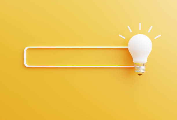 istock Search ideas or saving energy concepts with light bulb symbol on a yellow background. 1319172912