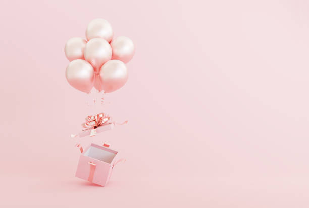 Surprise gift box and balloons on pink background.
