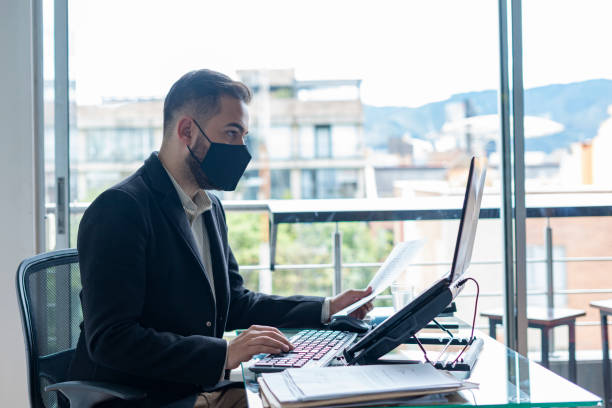istock Man working in an office on his laptop 1319173701