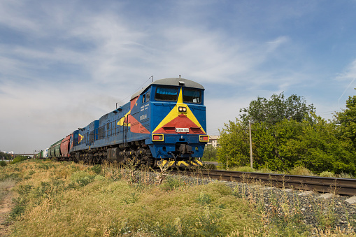 Uralsk, Kazakhstan (Qazaqstan), 18.07.2020: Freight train, diesel locomotive, rail transportation