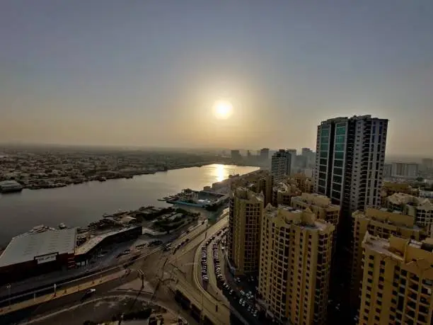 Sunrise Skyrim Ajman seaview skyscraper skyline  sunlight