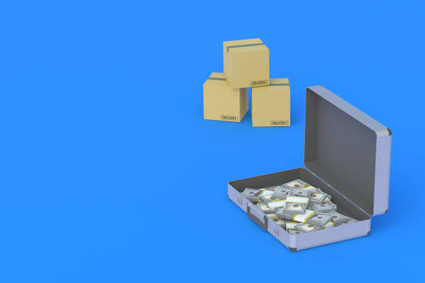 istock An open suitcase with banknotes next to stack of cardboard boxes. Money transfers by mail. Investing, reinvesting in transportation. Profitability, earnings of delivery services. 3d render 1319175757