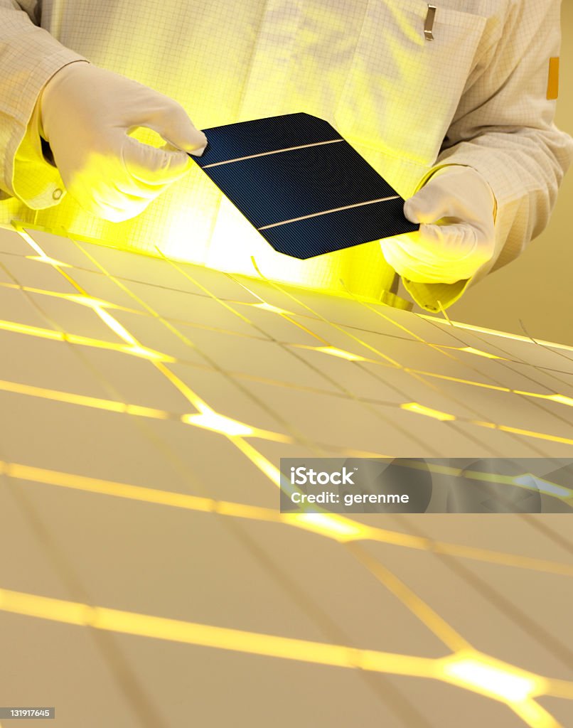 white collar worker with solar panel white collar workers with solar panel Solar Panel Stock Photo