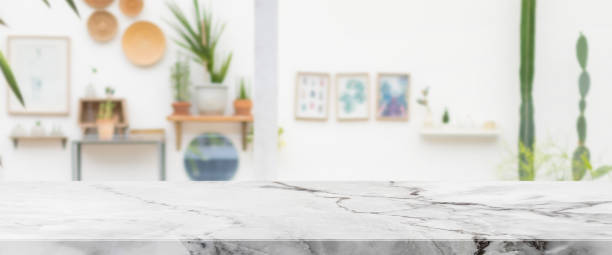 istock Empty white marble stone table top and interior space of cafe and restaurant banner mock up abstract background - can used for display or montage your products. 1319177785