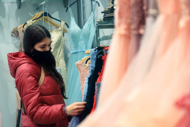 istock Girl looking for a dress 1319179973