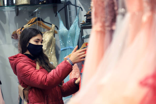 istock Girl looking for a dress 1319179978