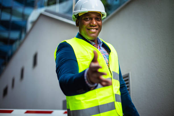 istock Businessman extending hand for handshake, close-up. 1319180270