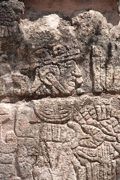 istock Mayan ruins with carved human figure in  Chichen Itza, Mexico 131918058