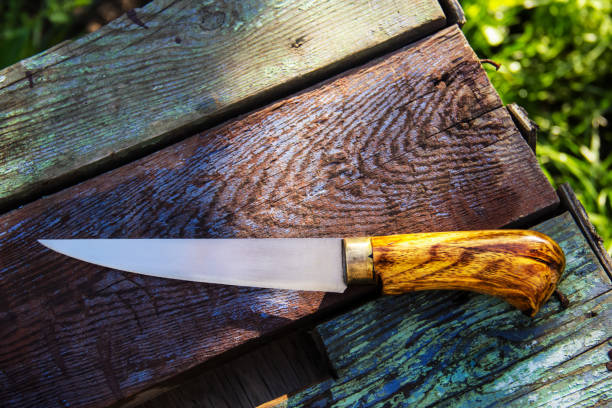 istock Kitchen knife with a wooden handle. Beautiful handmade kitchen knife 1319182287