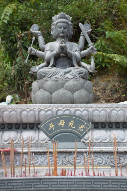 istock Stone statues inside Ten thousand Buddhas Monastery in Sha Tin area, Hong Kong - China 1319186076