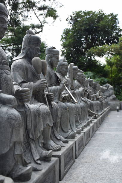 istock Stone statues inside Ten thousand Buddhas Monastery in Sha Tin area, Hong Kong - China 1319186625