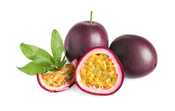 istock Cut and whole passion fruits with leaf isolated on white 1319188139