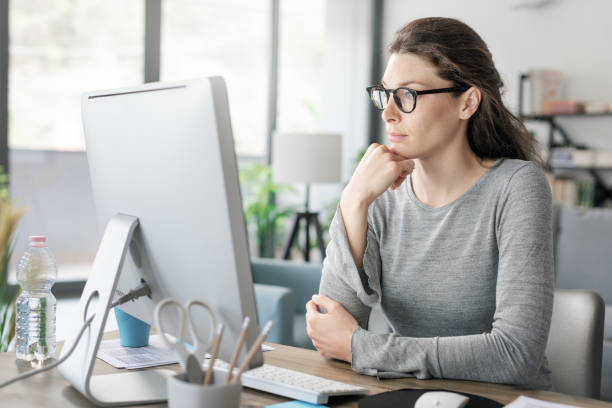 istock Professional woman working from home 1319189474