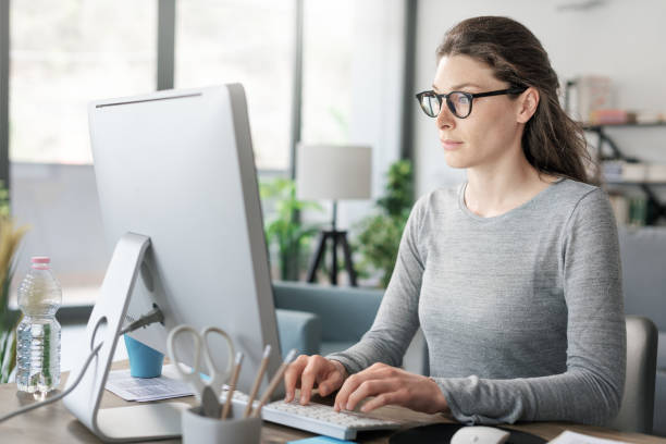 istock Professional woman working from home 1319189546