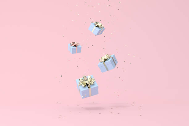 istock Minimal trendy scene of falling gift box on golden confetti particles background, 3D rendering. 1319189942