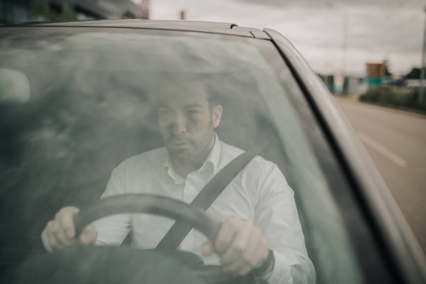 istock Businessman Driving 1319192267