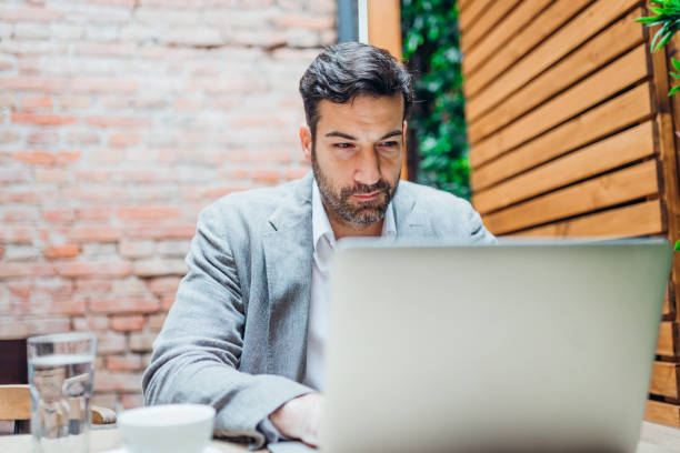 istock Young man making business in the coffee break 1319193050
