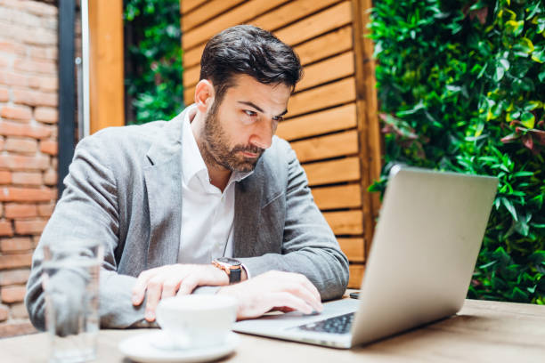 istock Young man making business in the coffee break 1319193969