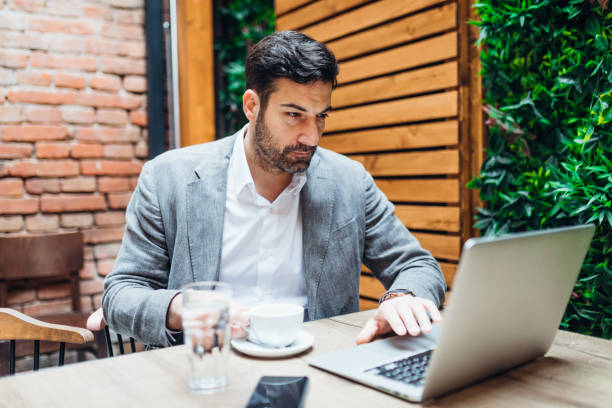 istock Young man making business in the coffee break 1319193997