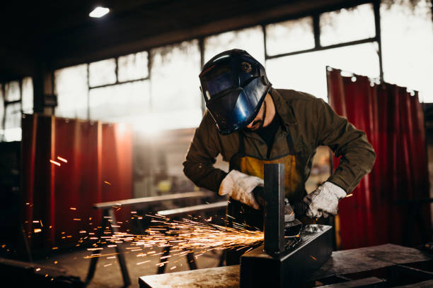 istock Welder working in a factory 1319195375