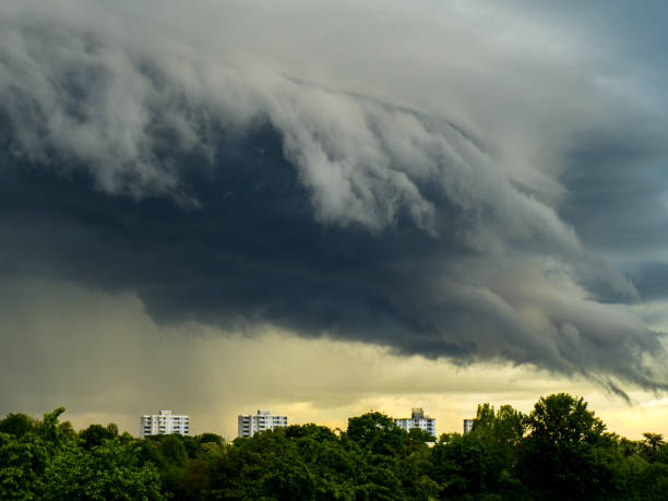 Ominous heaven, dark storm clouds over city