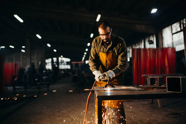 istock Welder working in a factory 1319195549