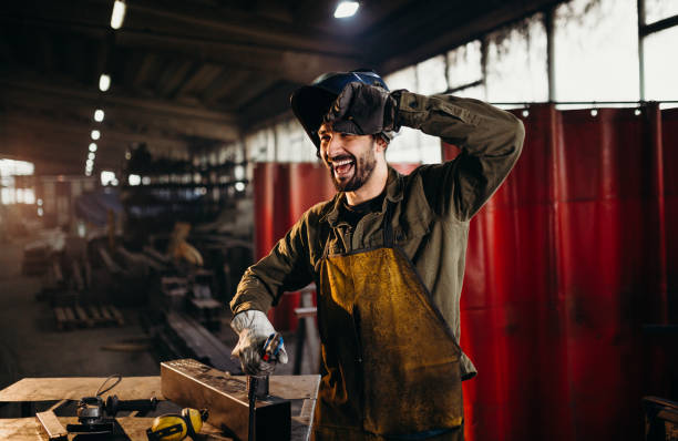 istock Welder working in a factory 1319195616