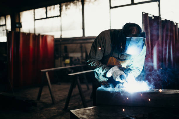 istock Welder working in a factory 1319195658