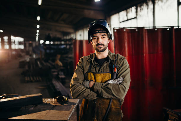 istock Welder working in a factory 1319195676