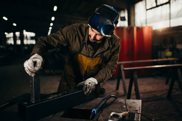 istock Welder working in a factory 1319195699