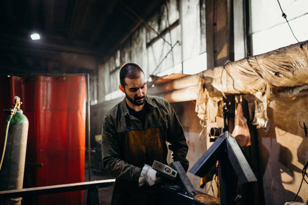 istock Welder working in a factory 1319195737