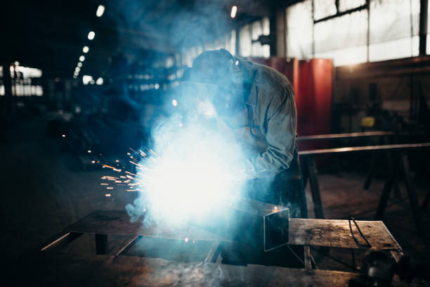 istock Welder working in a factory 1319195989