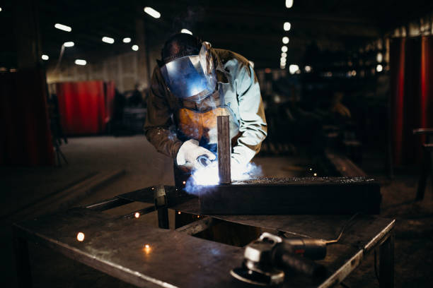 istock Welder working in a factory 1319196052