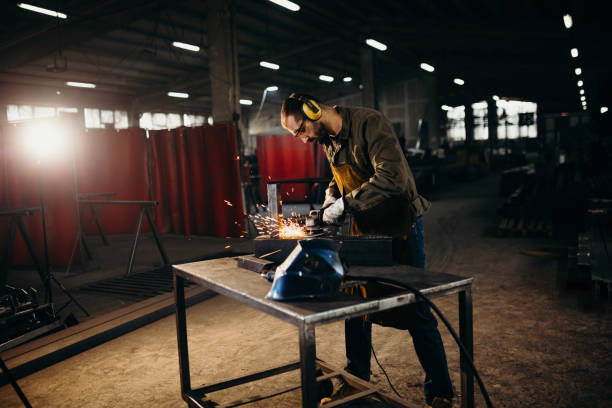 istock Welder working in a factory 1319196112