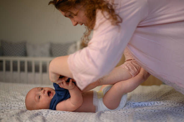 istock Mother bonding and playing with her baby 1319200332