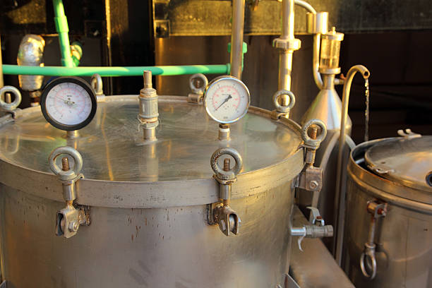 istock distillation of essential oils in factory 131920346