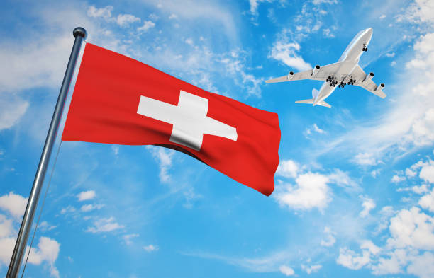 szwajcarska flaga z samolotem - swiss culture airplane airport business zdjęcia i obrazy z banku zdjęć