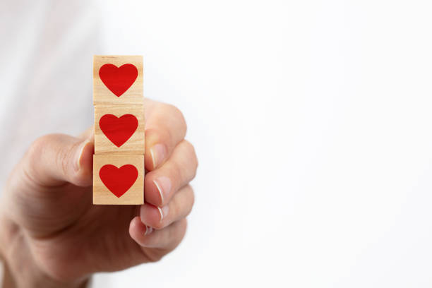 istock red heart symbol on wooden cube
Isolated at white background. 1319215457