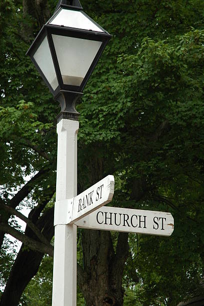istock Bank and Church Lamp Post 131922127