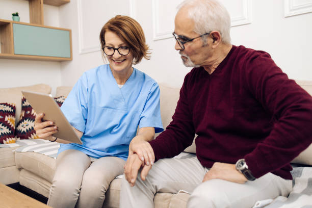 istock Senior man having a home doctor's visit 1319227939